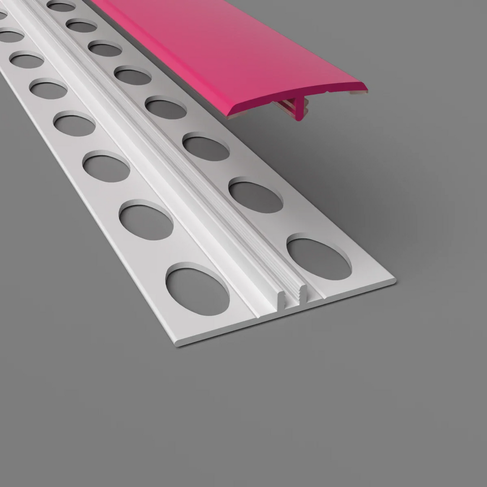 Élément de jonction en PVC rose, type H, conçu pour des finitions douces et modernes.